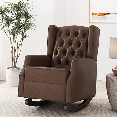 Chaise berçante à oreilles capitonnée