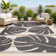 Colgin Classic Beach Stripe and Monstera Leaf Black/Beige Indoor/Outdoor Rug