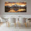 Ensemble de 3 toiles murales représentant un coucher de soleil sur un paysage de montagne-646948510