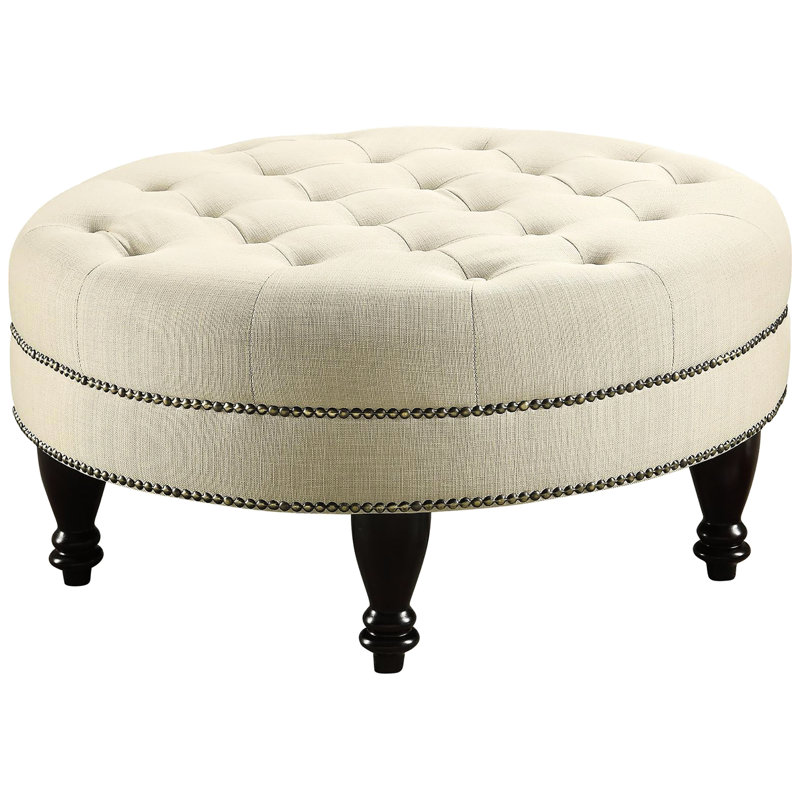 Gruau invitant avec motif et ensemble de pieds brun foncé avec décoration touffetée élégante
