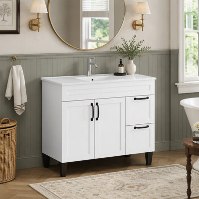 Meuble-lavabo moderne avec lavabo, 2 portes, 2 grands tiroirs, poignées en métal et charnières à fermeture douce pour un rangement optimisé et un style élégant.