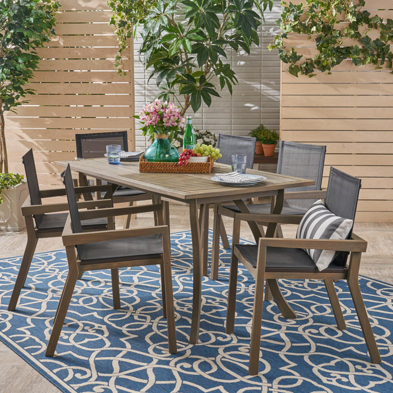 Carlin 6 - Person Acacia Wood Patio Dining Set with Rectangular Table