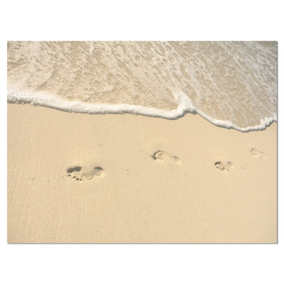 Footprints in Sand on the Beach Photographic Print on Wrapped Canvas