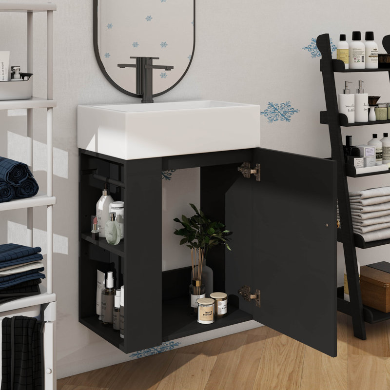 Le meuble-lavabo mural de 20 pouces est livré avec un lavabo et une unité de rangement unique avec une armoire et deux tablettes de rangement à gauche