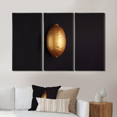 Fleurs tropicales dorées sur fond noir I - reproduction flottante sur toile 3 pièces