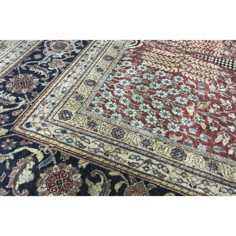 Tapis rouge et ivoire noué à la main de haute qualité