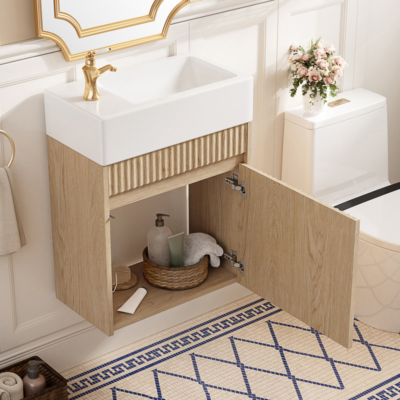 Meuble-lavabo flottant avec lavabo en résine et porte à pousser sans ouverture
