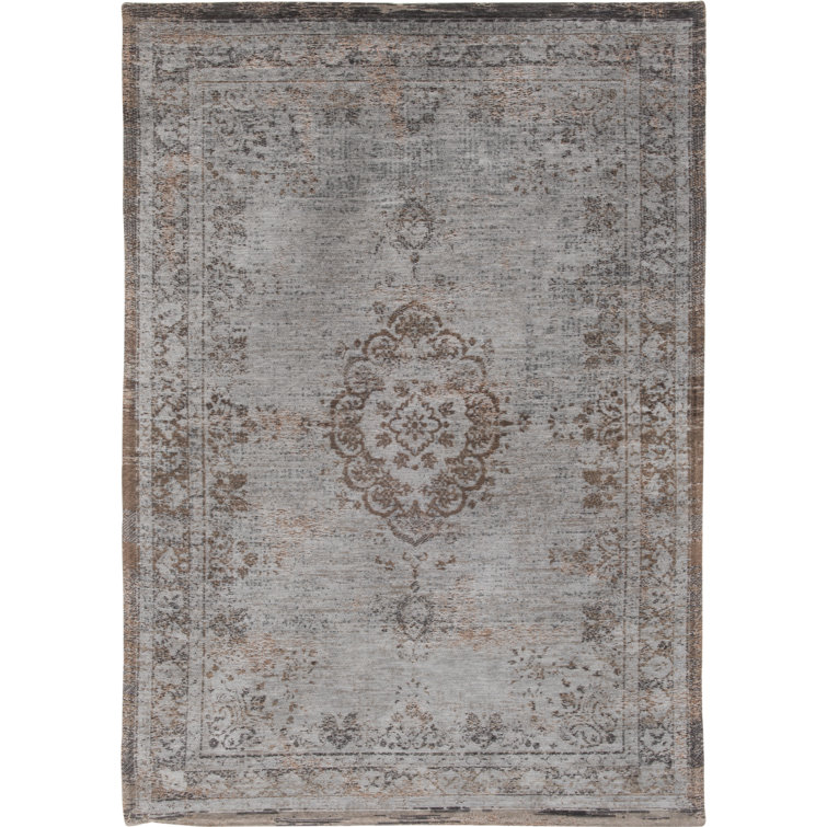 Fading World Oriental Area Rug
