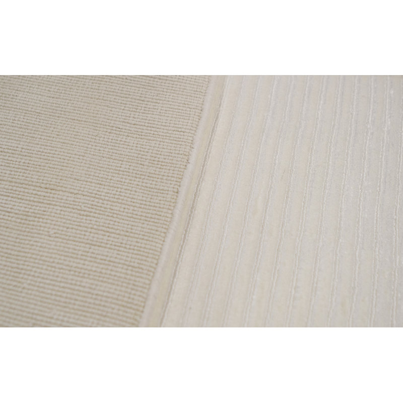 Tapis ivoire noué à la main de haute qualité