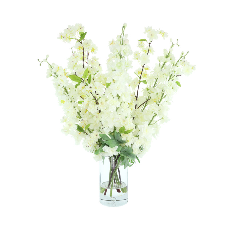 Delphinium And Cherry Blossom In Glass Vase