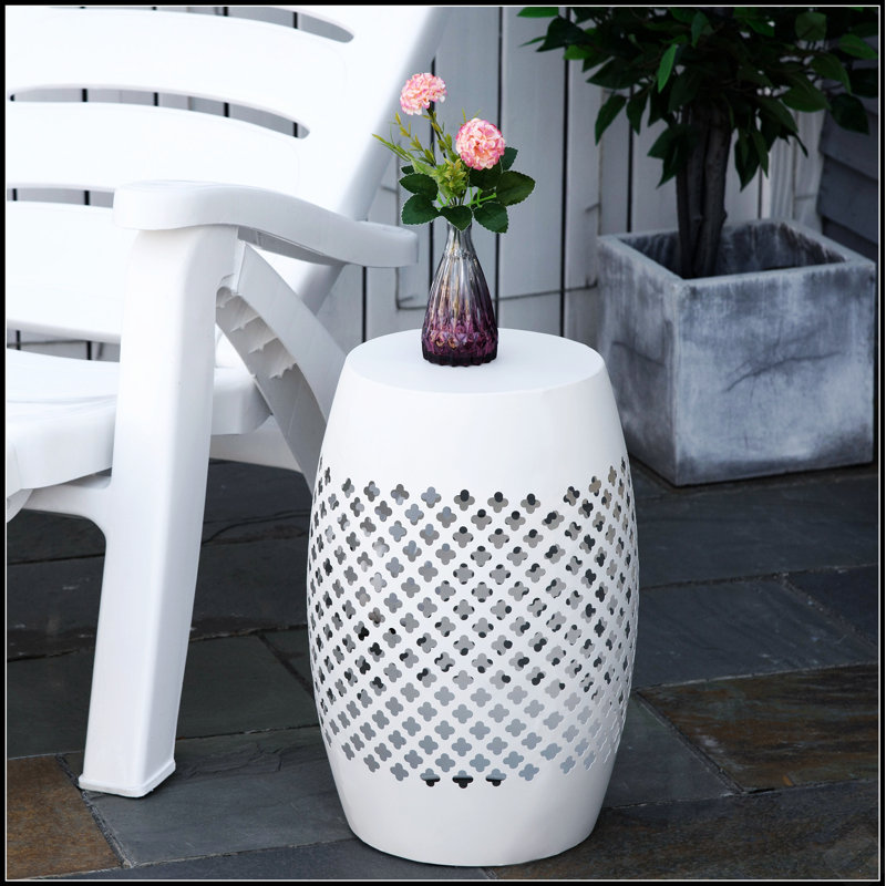 Élégante table de bout de patio en acier, conception ronde à tambour creux pour une utilisation intérieure et extérieure, parfaite pour ajouter élégance et fonctionnalité