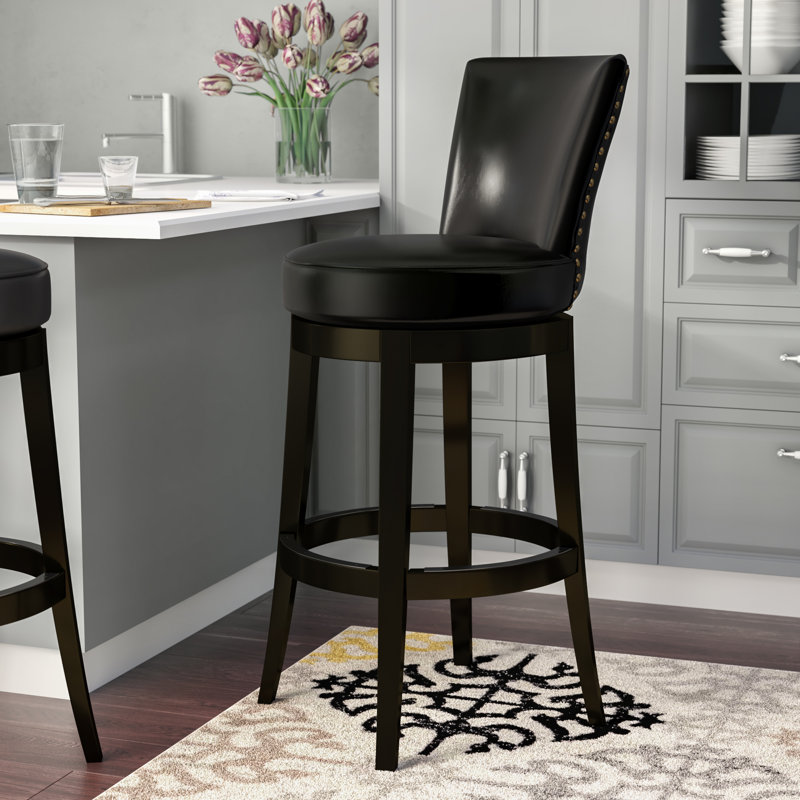 Alesja Swivel Counter or Bar Height Armless Bar Stool with Footrest in Faux Leather and Black Wood, White/Black Zebra