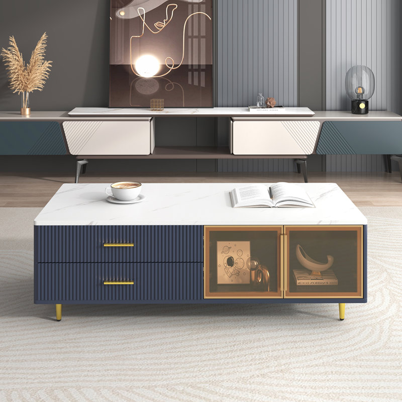 Élégante table basse avec rangement en verre, plusieurs tiroirs, pieds en métal et éclairage pour des espaces de vie améliorés.