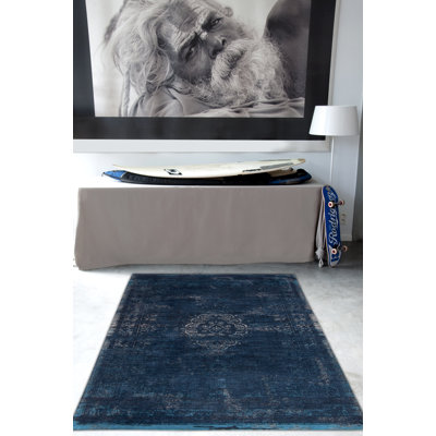 Fading World Oriental Area Rug