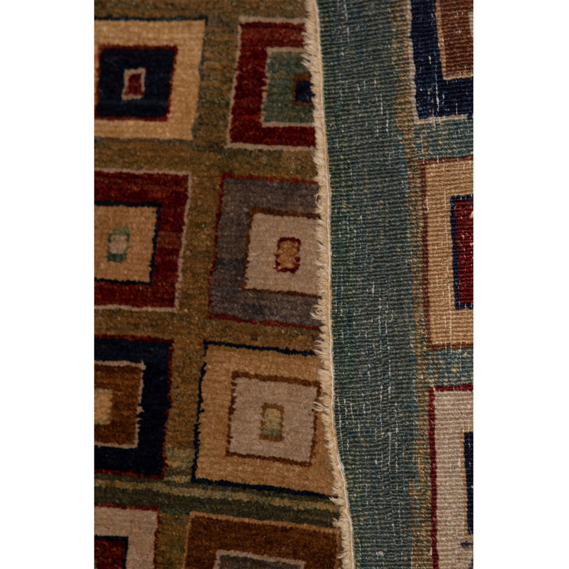 Tapis vert clair de grande qualité noué à la main
