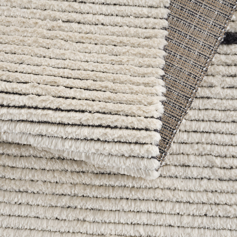Allie Black & Ivory Synthetic 5' x 7' Easy-Care Area Rug