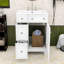 Meuble-lavabo simple autoportant avec deux tiroirs de rangement et lavabo en céramique Olguin-923375376