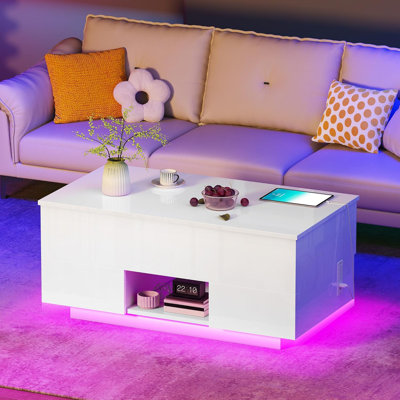 Table basse à plateau relevable avec prises de courant et station de charge, table moderne blanc brillant avec 2 tiroirs et tablettes ouvertes