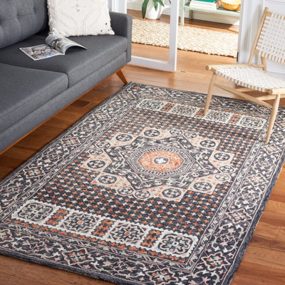 Hand Tufted Wool/Cotton Oriental Rug in Black/Rust