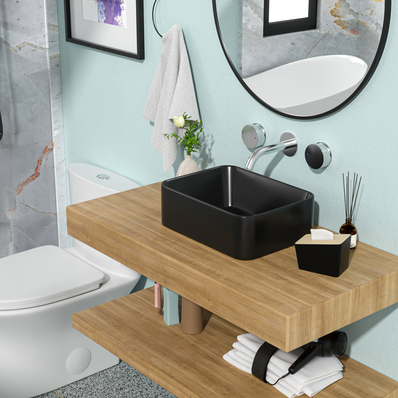 Black Ceramic Bathroom Sink 16"X12", Matte Finish. Modern And Elegant Look. Quality Ceramic, Low Water Absorption. Stain , Easy Maintenance. Above Counter Installation. 1 3/4" Center Drain Hole.