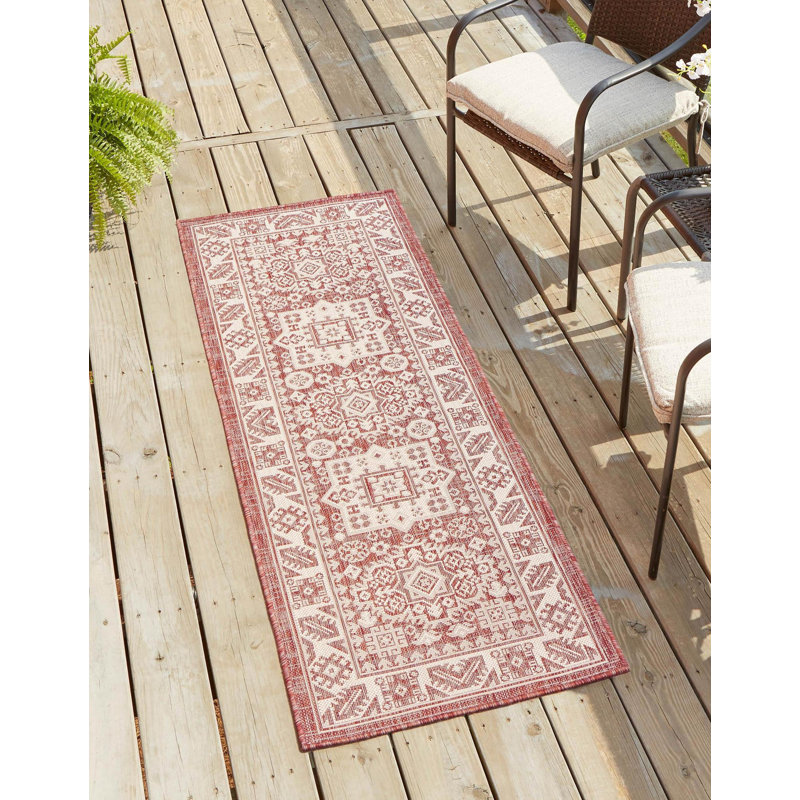 Archange Southwestern Machine Woven Polypropylene Indoor / Outdoor Area Rug in Rust Red, Runner 2'7" x 12'