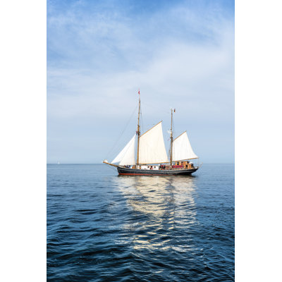 Ship On Blue Water by Reach-art - Wrapped Canvas Print