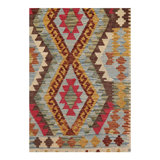 Lutha Wool Oriental Area Rug in Red
