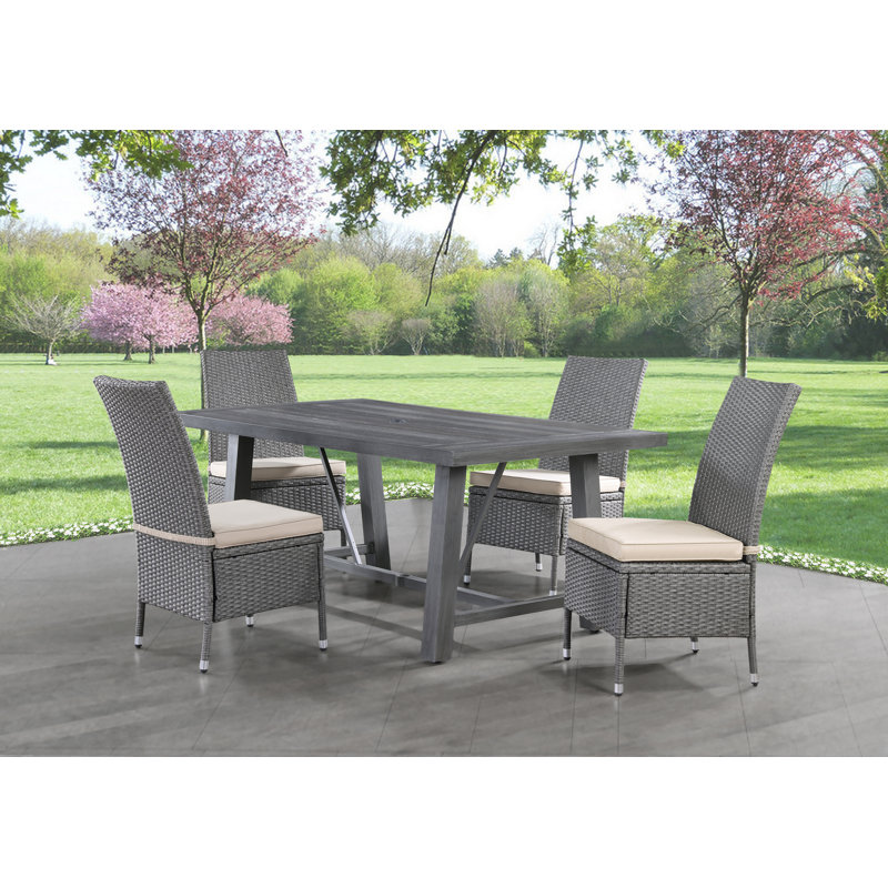 Arza 4 - Person Wicker Patio Dining Set with Rectangular Table , Cushions Included