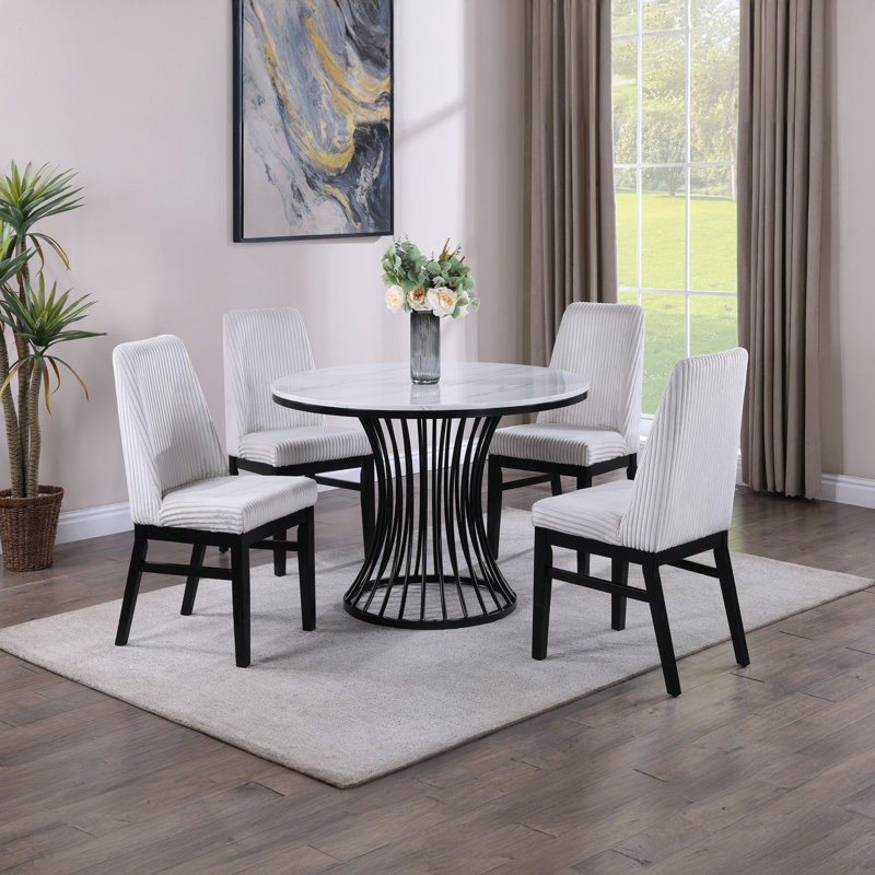 Finition noire unique de la table de salle à manger en faux marbre blanc