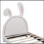 Lit plateforme tapissier en cuir avec ornement en forme de lapin-763780380-763780371