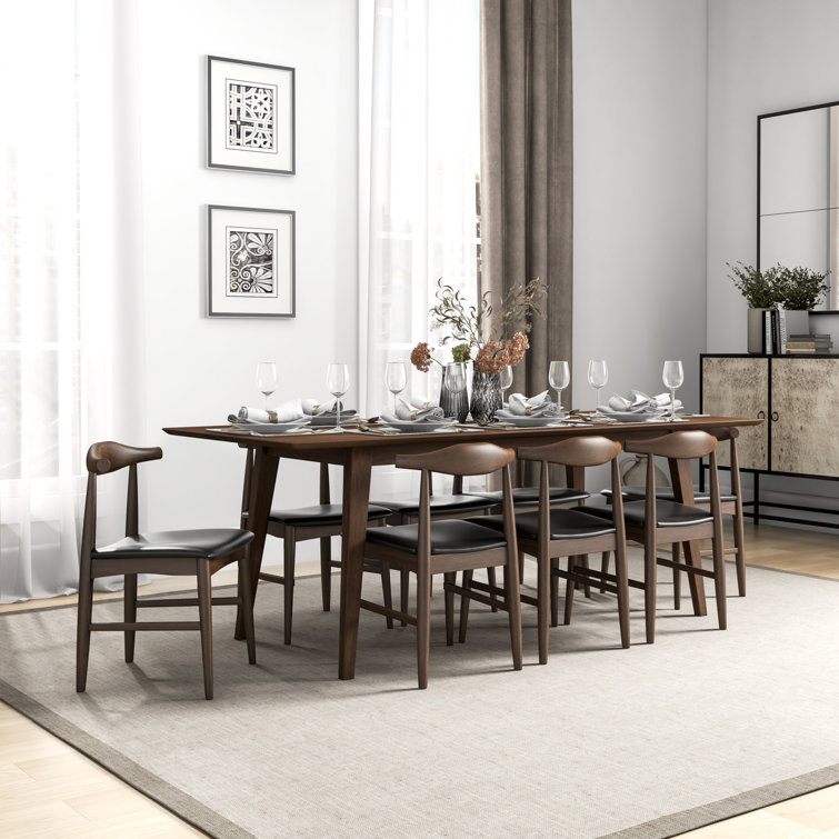 https://assets.wfcdn.com/im/25136780/resize-h755-w755%5Ecompr-r85/2454/245481764/Aden+9-Piece+Mid-Century+Dining+Set+W%2F+8+Faux+Leather+Dining+Chairs+In+Black.jpg