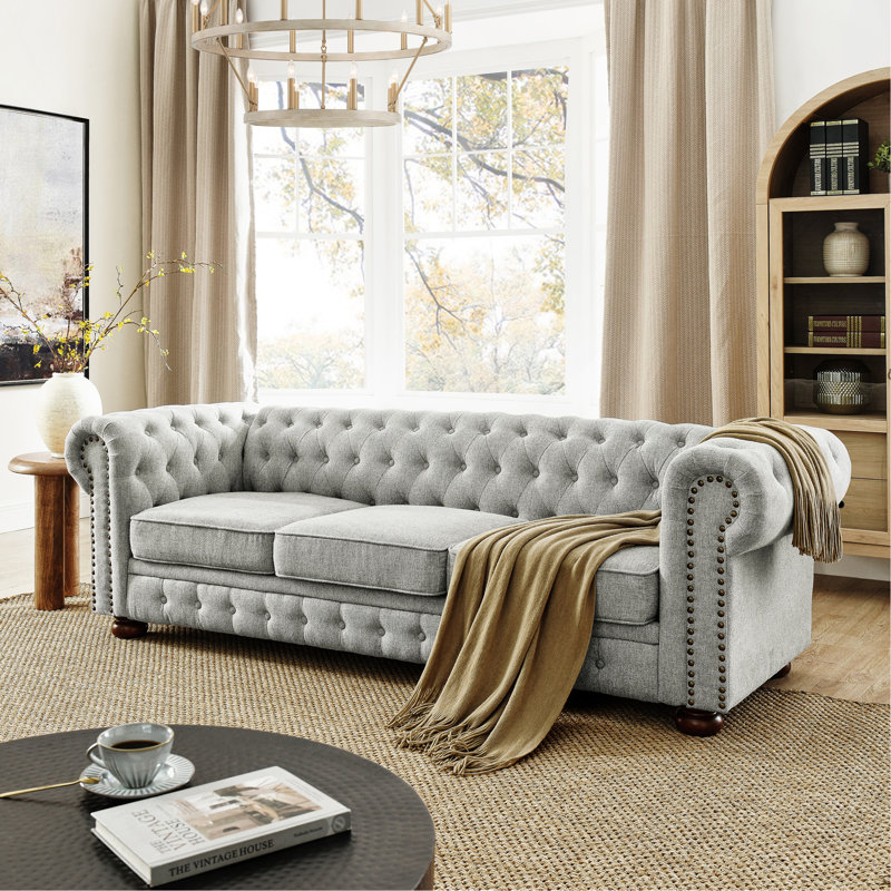 Canapé Chesterfield en lin capitonné 3 places