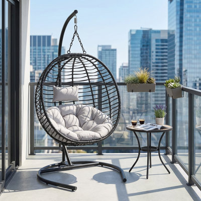 Élégant fauteuil œuf pliant pour une personne à l'intérieur et à l'extérieur, avec pieds réglables antidérapants et conception en osier durable