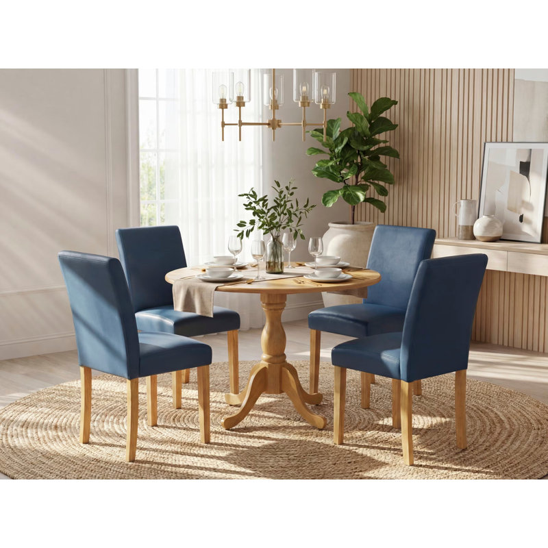 L'ensemble de salle à manger 5 pièces comprend une table de salle à manger ronde avec Dropleaf et 4 chaises Parson revêtues de similicuir bleu Oasis, en chêne