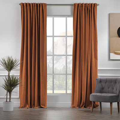 Paire de rideaux obscurcissant avec pattes de couleur unie