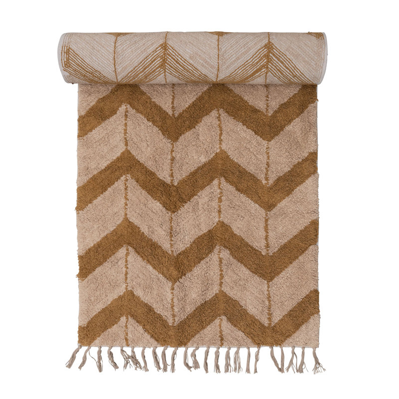 Tapis de sol en coton touffeté à motif chevron et franges