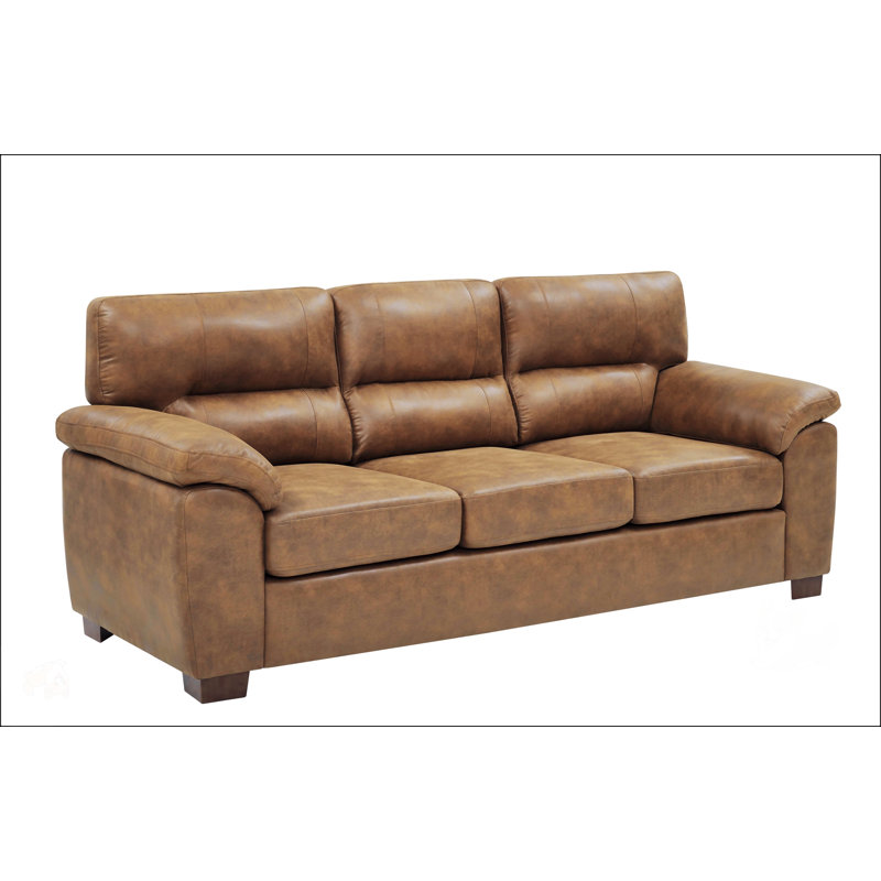 Canapé rétro en cuir à trois places, confort luxueux et design classique pour une élégance intemporelle dans n'importe quel salon.