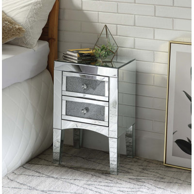 Table de bout rectangulaire en miroir avec tiroirs en verre trempé, pieds fuselés élégants et décorations élégantes en simili pierre pour un décor moderne et un rangement compact.