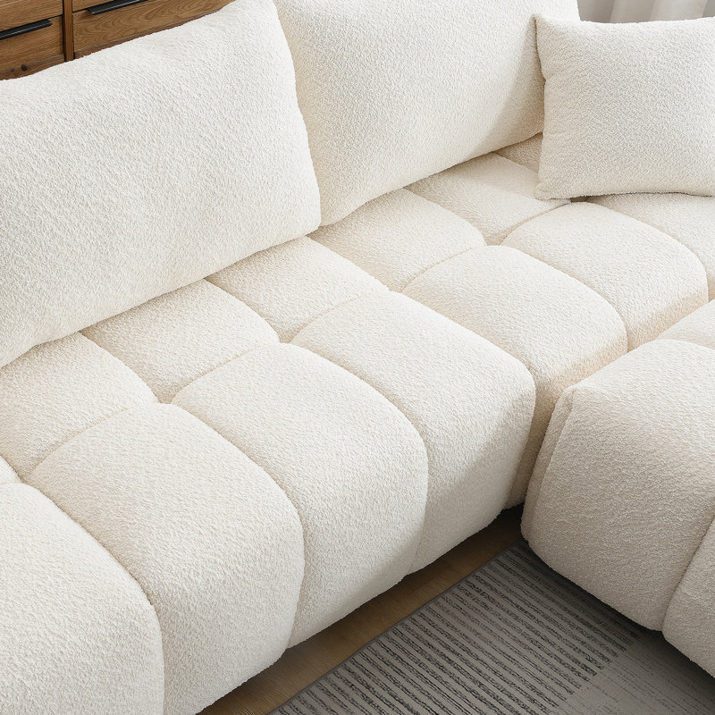 Canapé modulaire de 110 po en forme de L avec siège très grand, conception en ligne, repose-pieds mobile, mousse haute densité, combinaison libre, structure en métal et bois robuste, tissu bouclé, 3 couleurs