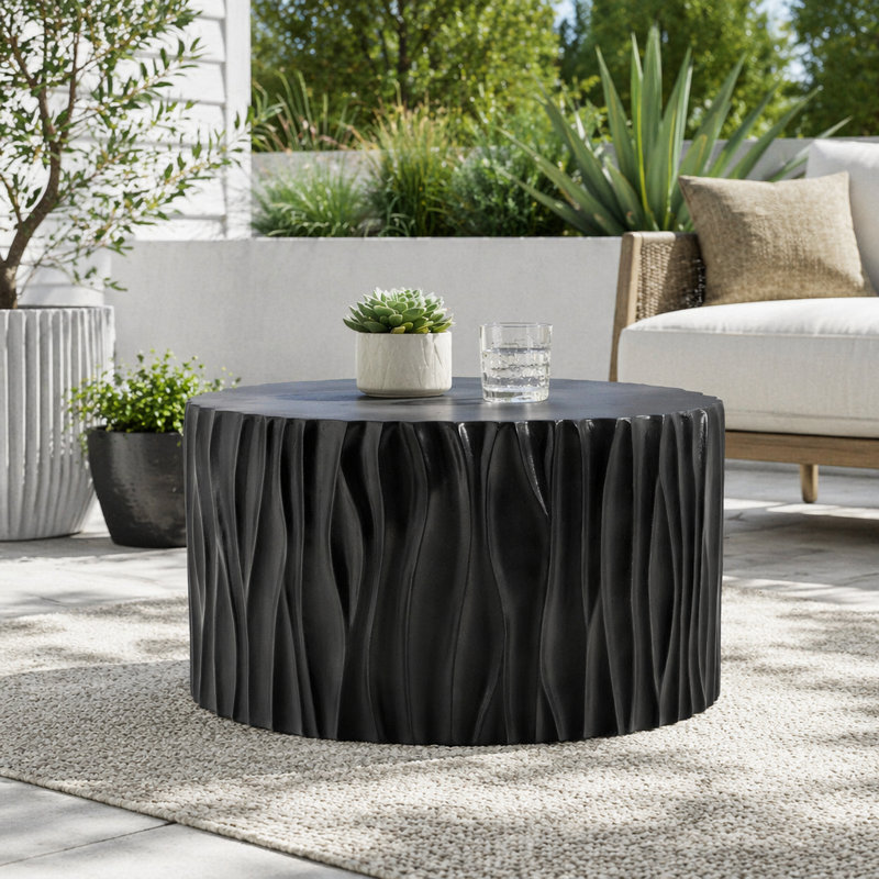 Table basse sculpturale ronde MGO avec texture ondulée