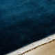 Clio Solid Color Hand Loomed Wool Area Rug in Blue