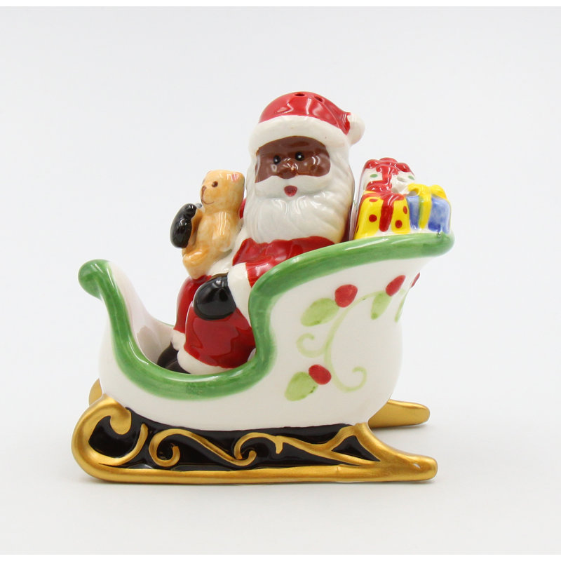 Ensemble de salière et poivrière Père Noël afro-américain sur traîneau