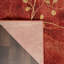 Tapis à motif floral rouge flamme / brun Arnim-370477741