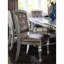 Chaises de salle à manger de style glamour: finition argentée, bois, similicuir, boutons latéraux en cristal et design moderne glamour