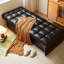 Canapé-lit modulaire en similicuir noir avec rangement