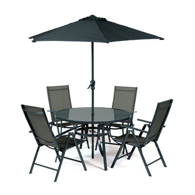 Woodminster 4 - Person Patio Dining Set with Round Table