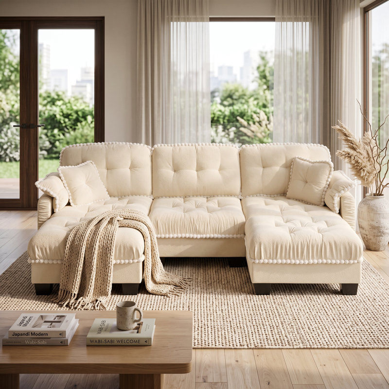 Canapé 3 places Cloud en chenille beige crème avec 2 poufs amovibles, coussins capitonnés et finis à pompons