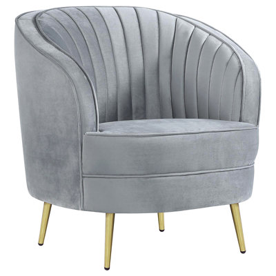 Chaise capitonnée grise et dorée