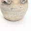 Vase rustique en terre cuite texturée avec quatre poignées-714276208