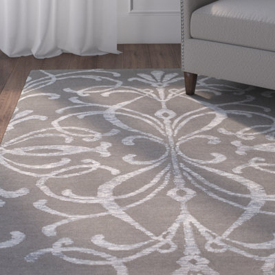 Tapis brun foncé tissé à la main Delavan Ikat
